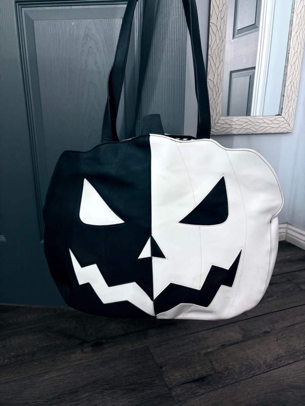 Dolls Kill Black & White Jack-O'-Lantern travel bag